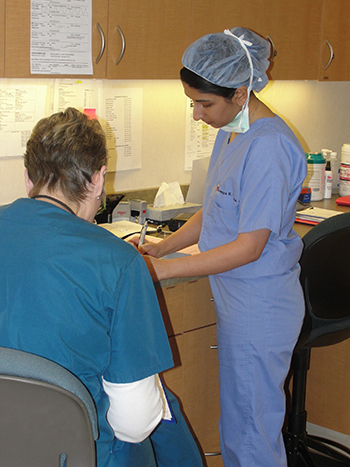 Doctor helping a patient