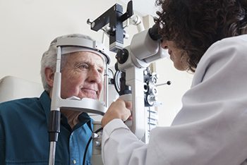 Older man having an eye exam