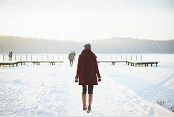 Woman walking in the snow