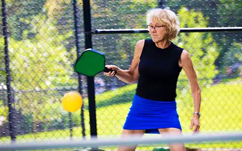 Woman Playing Pickleball