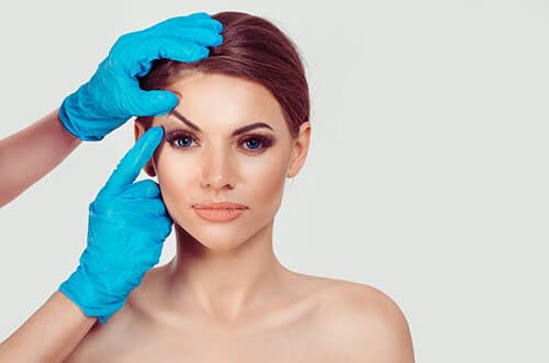 Woman Being Prepped For an Eyebrow Lift